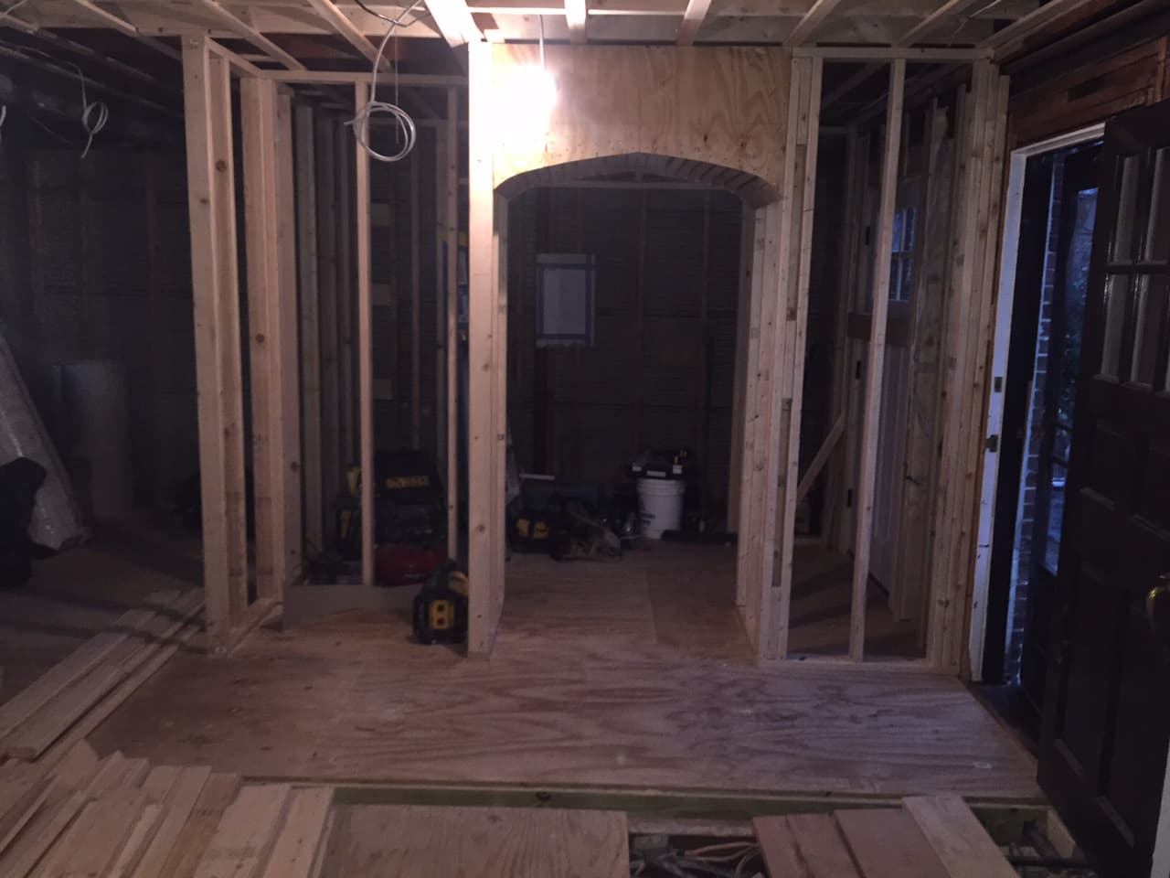 Framed arched doorway before drywall